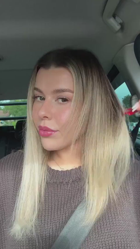 Halo extensions blended into ombre blonde hair